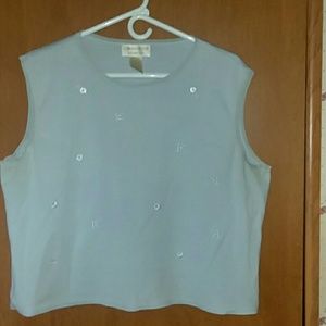 A light blue crop sleeveless shirt.